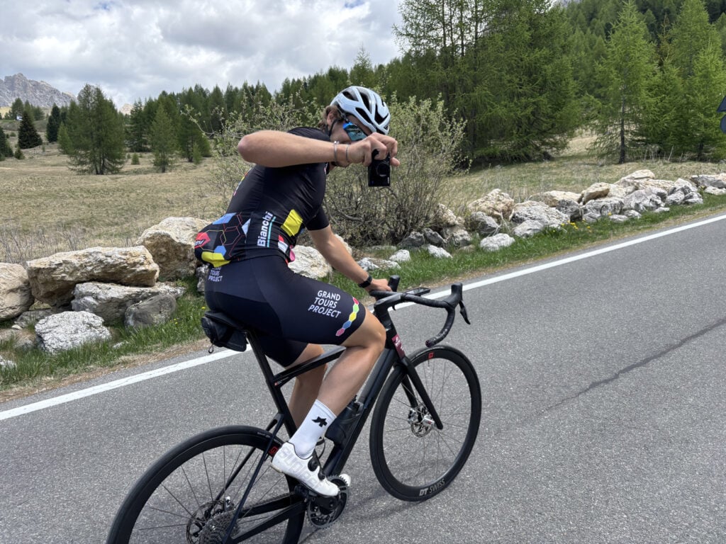 Grand Tours Project guide capturing a photo in the Dolomites